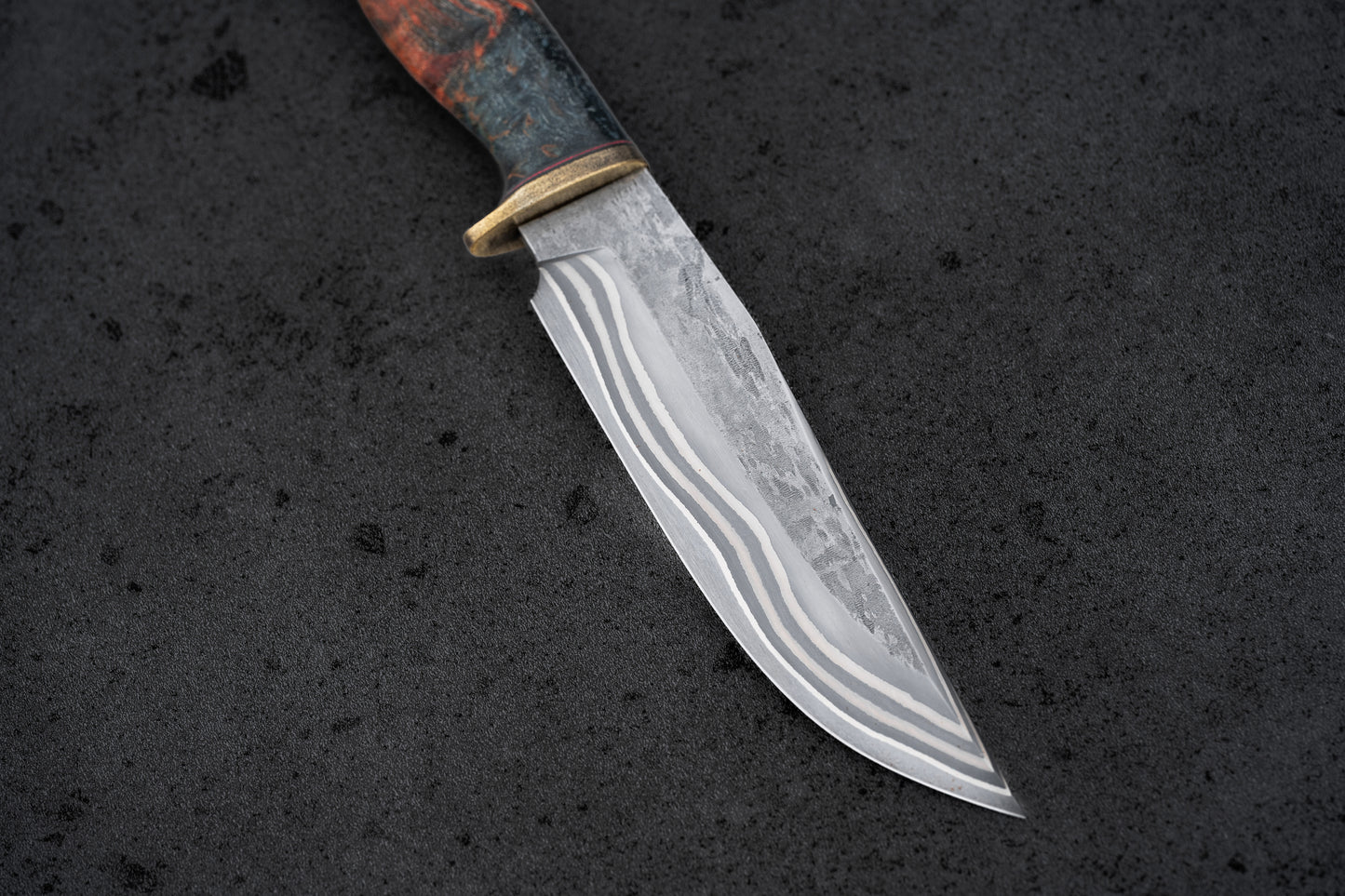 Damascus Bowie knife. Stainless San Mai